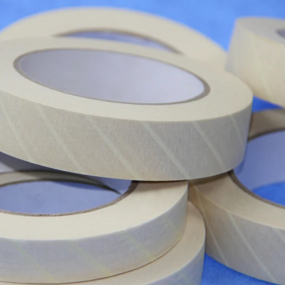 Autoclave tape adhesive with indicator