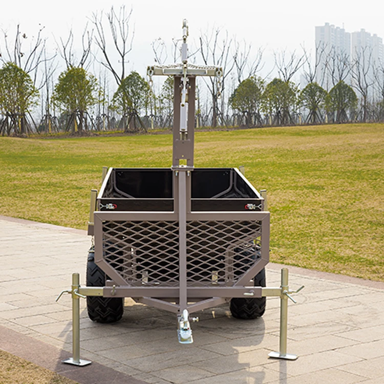 Black dump steel with electric brakes and loading ramps box trailer