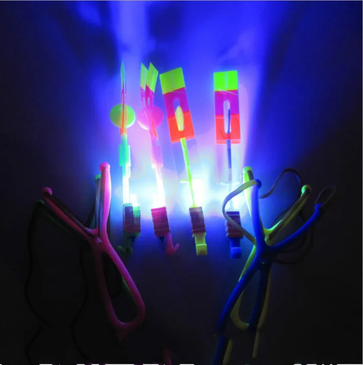 Amazing Gadget Led Light Toy Elastic Powered Slingshot Rubber Band Flying Arrow Helicopter