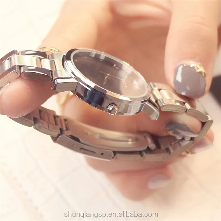 Hot Sell Fashion Pointer Couple Steel Wrist Quartz Watch