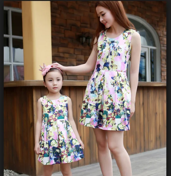 Fancy mom and daughter matching clothing, stylish mother and girls dresses printed party dress image