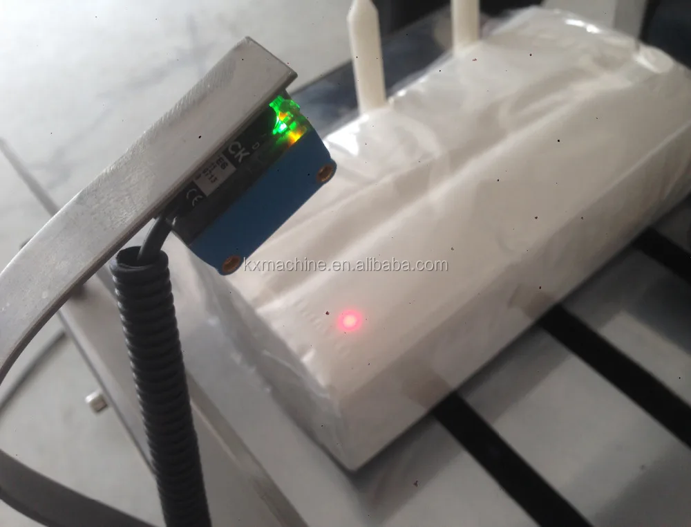 Автоматическая машина для упаковки бумажных коробок на лице