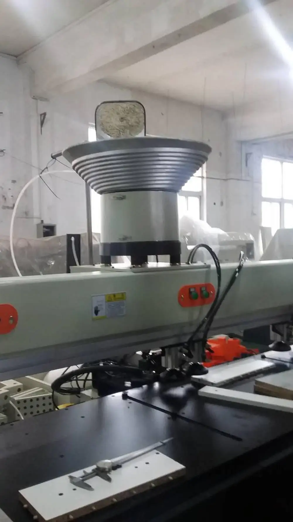 
wood boring and inserting dowel machine 