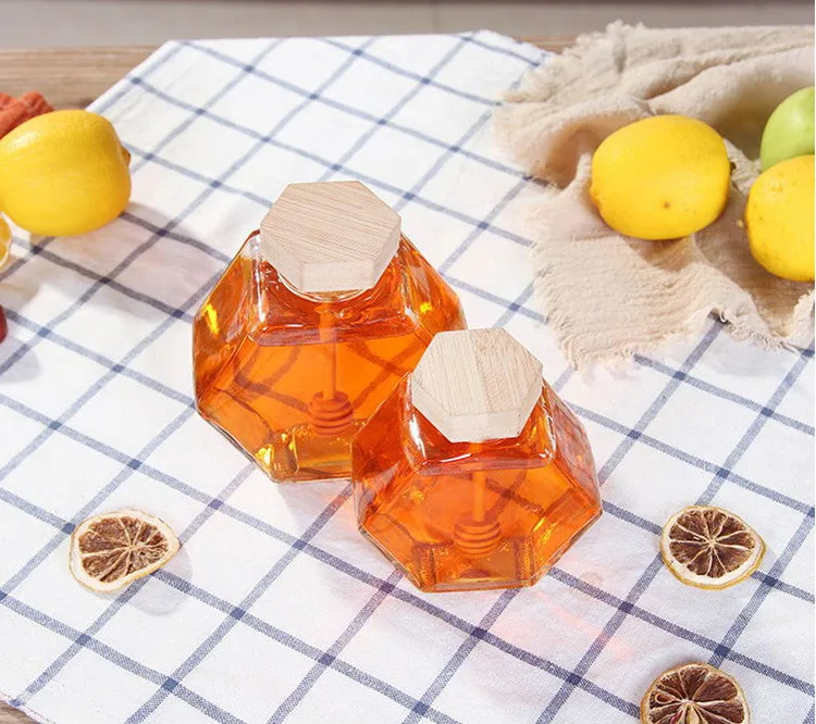 Оптовая продажа 100 мл шестигранная пустая Роскошная стеклянная банка для хранения меда с деревянной крышкой