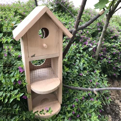 Bird house with feeder