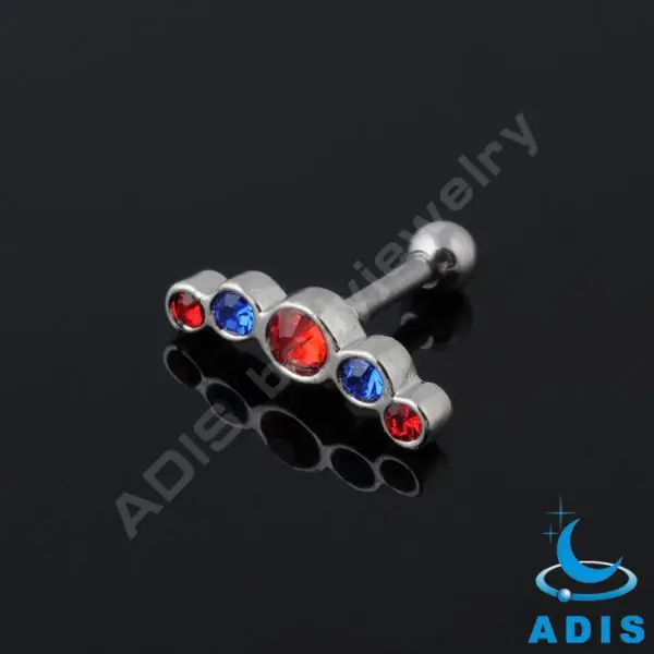 Jeweled ear tragus piercing with helix piercing