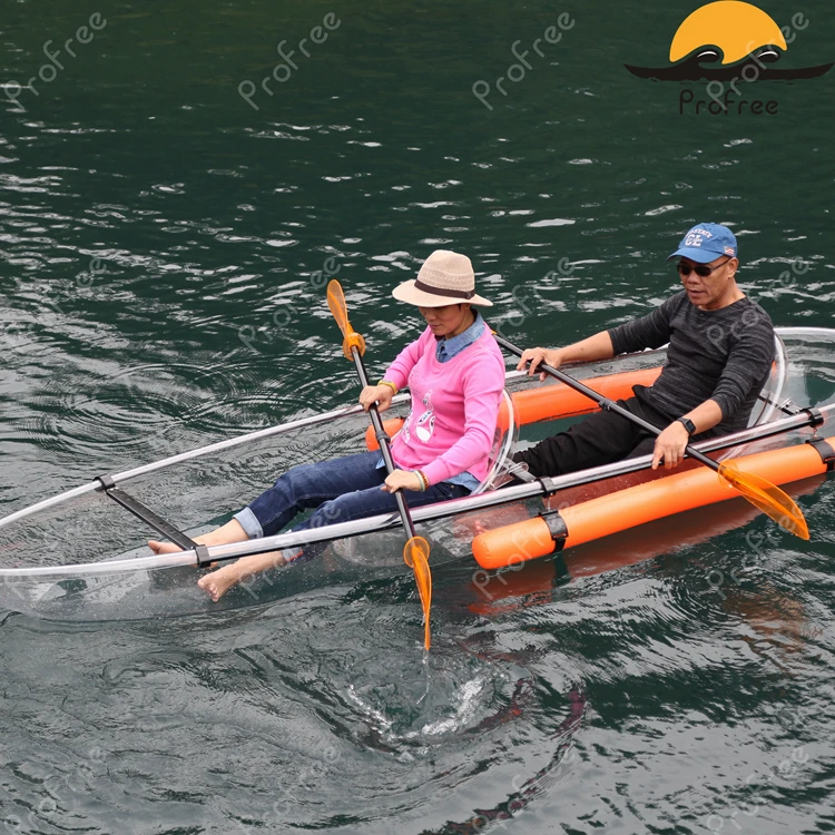 
transparent kayak with outrigger and airbag ans fishing life jacket 