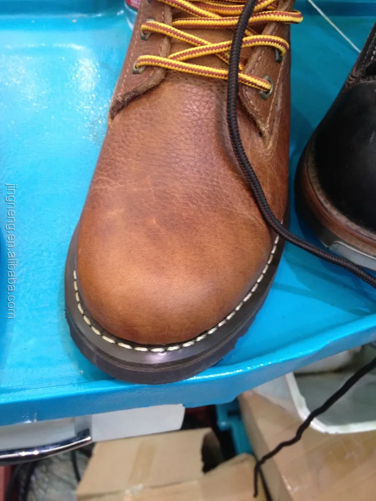 AUTOMATIC TOE LASTING MACHINE