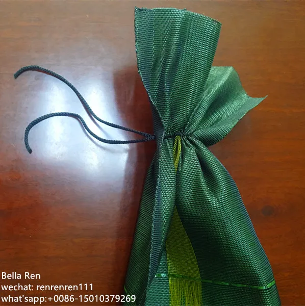 Silobag PE 27x120 green with closing twine printed in black with logo 117gr/unit