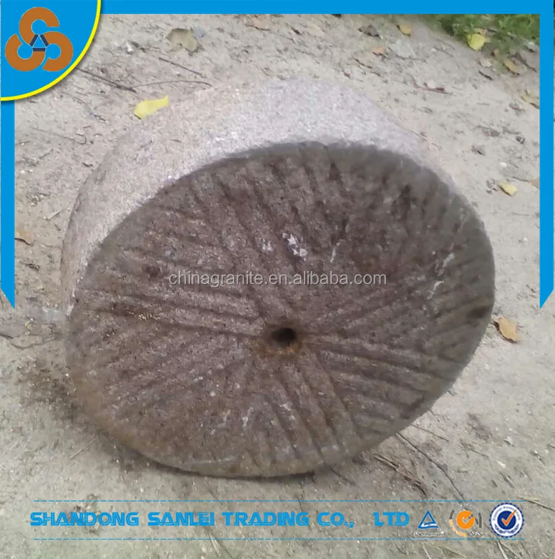 Sale real old millstone outside steps stone