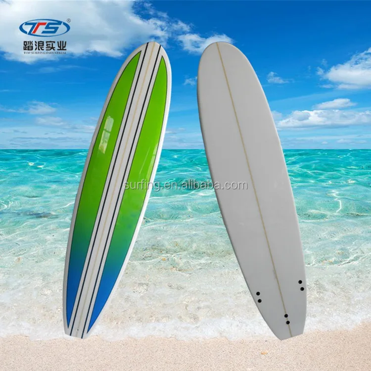 epoxy funboard surfboard with fins leash deck pad