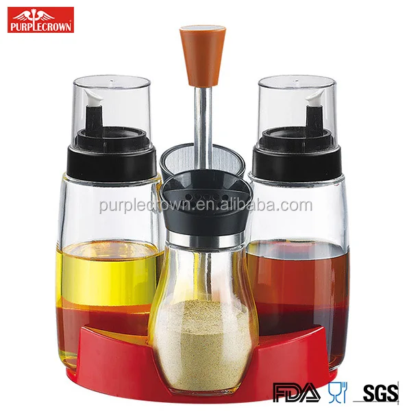 Wholesale hot selling 4 in 1 Set Glass Bottles for Olive Oil Vinegar Soy Sauce Dispenser with Plastic Rack