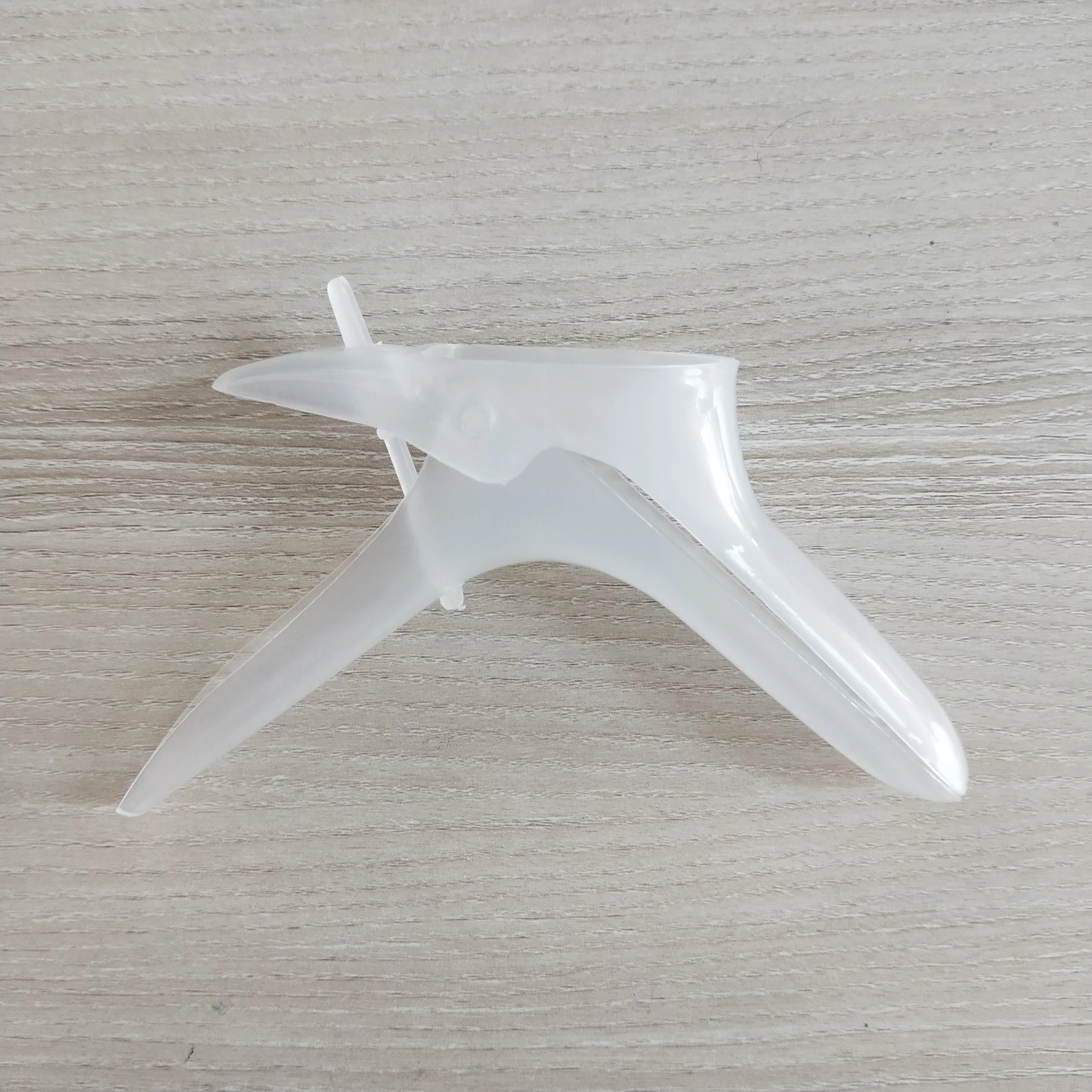 Disposable vaginal dilator for medical gyn examination