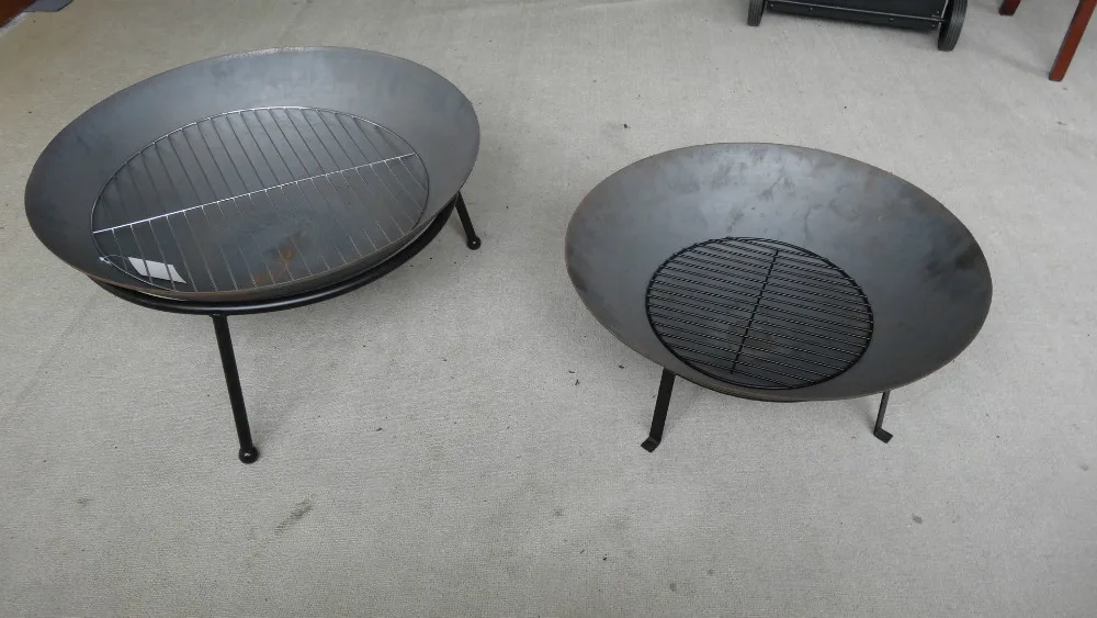 
outdoor cast iron fire pit/bowl with wood grill 