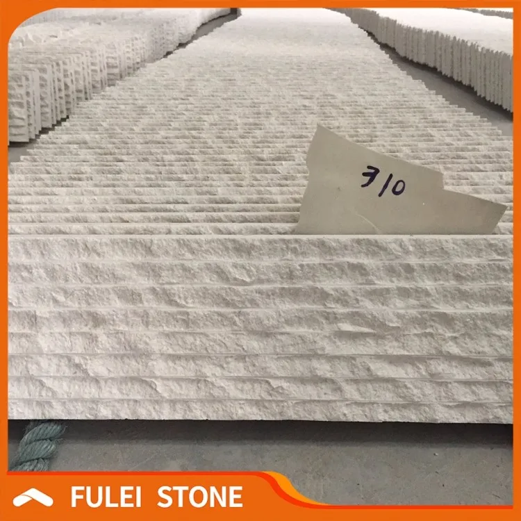 Облицовочная плитка из белого известняка с резной поверхностью