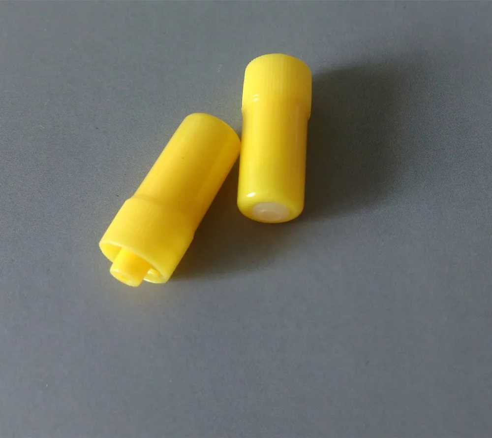 Disposable yellow heparin cap for iv catheter for animal