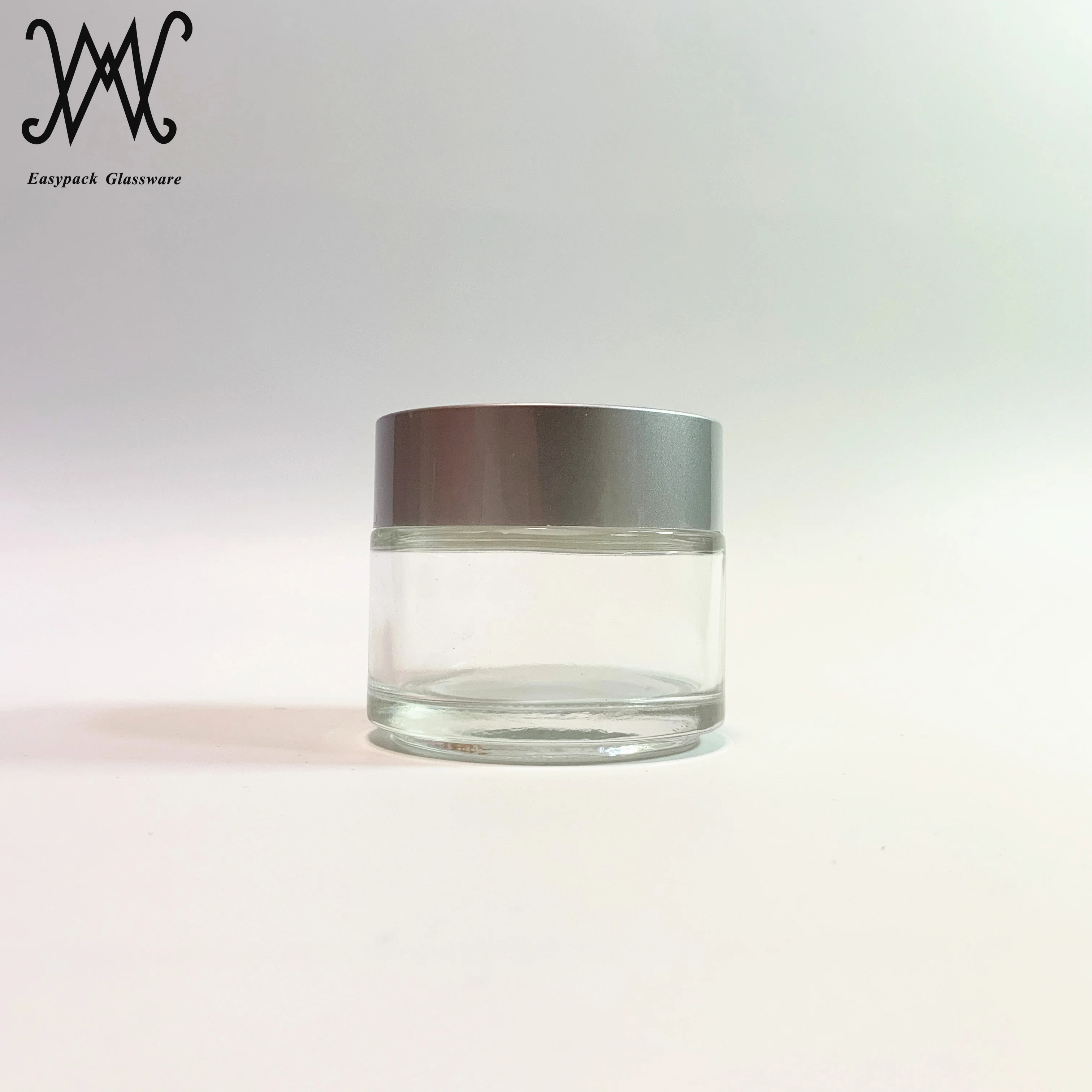 100g 100ml clear glass cosmetic packaging jar with gold metal lid for cream oil