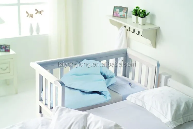 attachable cot to bed