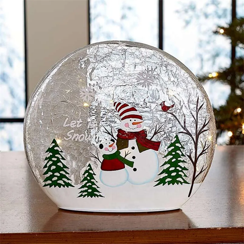 Hand drawn lit glass ball accent. Christmas decoration crack ball