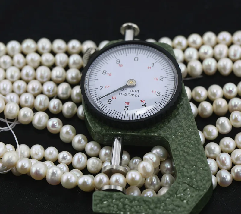 6-7mm potato shape AA grade white real pearl farm Chinese freshwater pearls