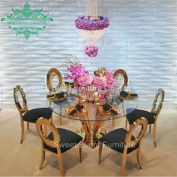 Clear glass top wedding reception chairs and tables with ss base