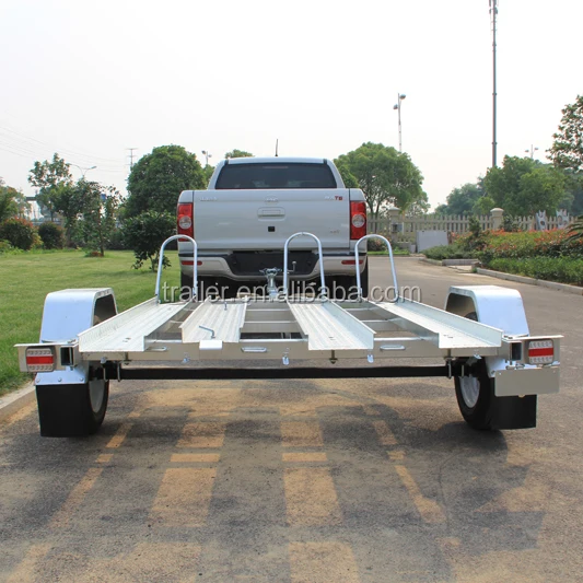 3 Motorcycles Transporting Trailer