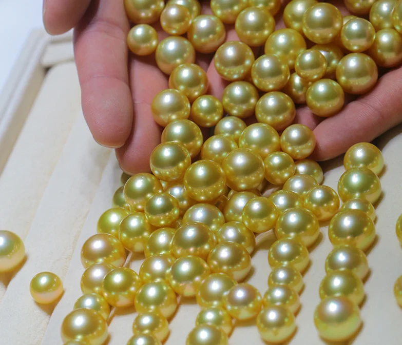 10-11mm 3A grade large big size supply wholesale gold golden color real genuine natural south sea pearls