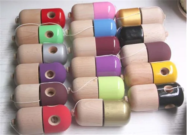 PU panite The pill shaped kendama Beech making degradable toy