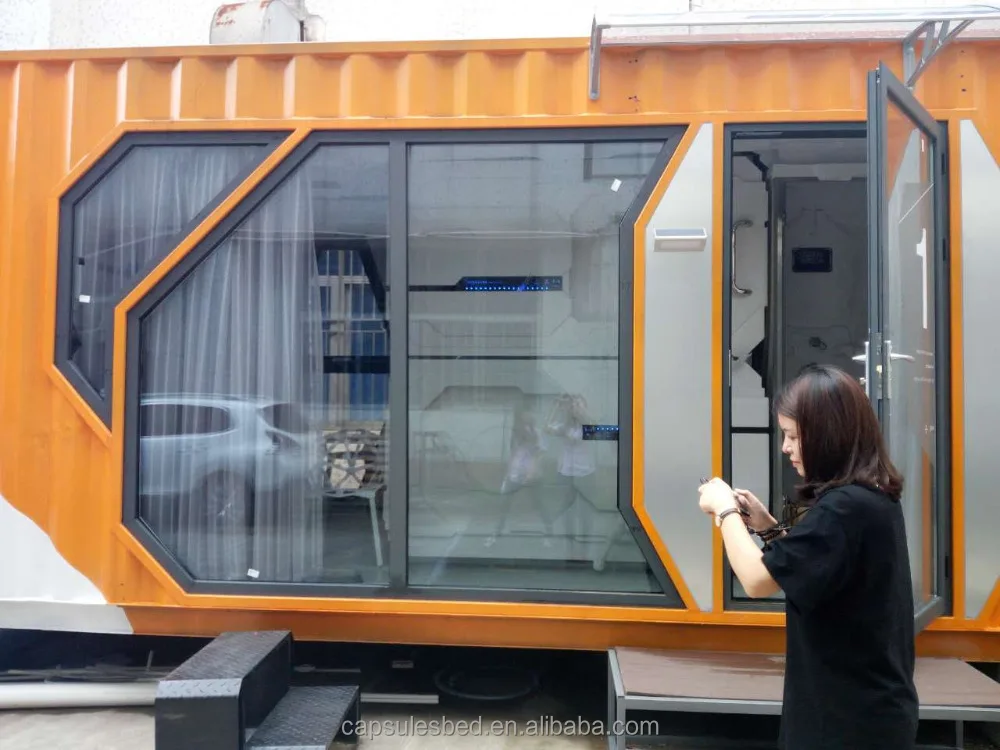 Mobile expandable container house luxury with capsule bed with shower and toilet with A/C with lockers with seats and desks