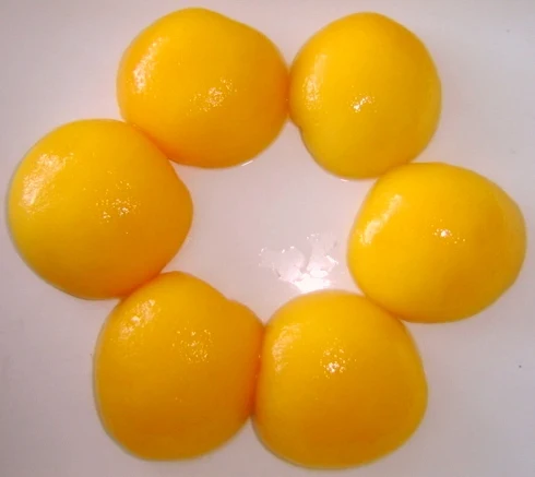 Консервированные фрукты (желтый персик в баночках)