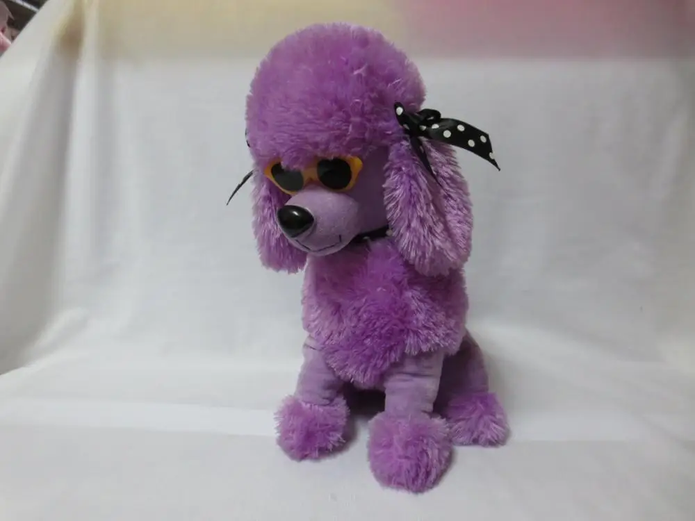 Plush poodle dog with eye glass