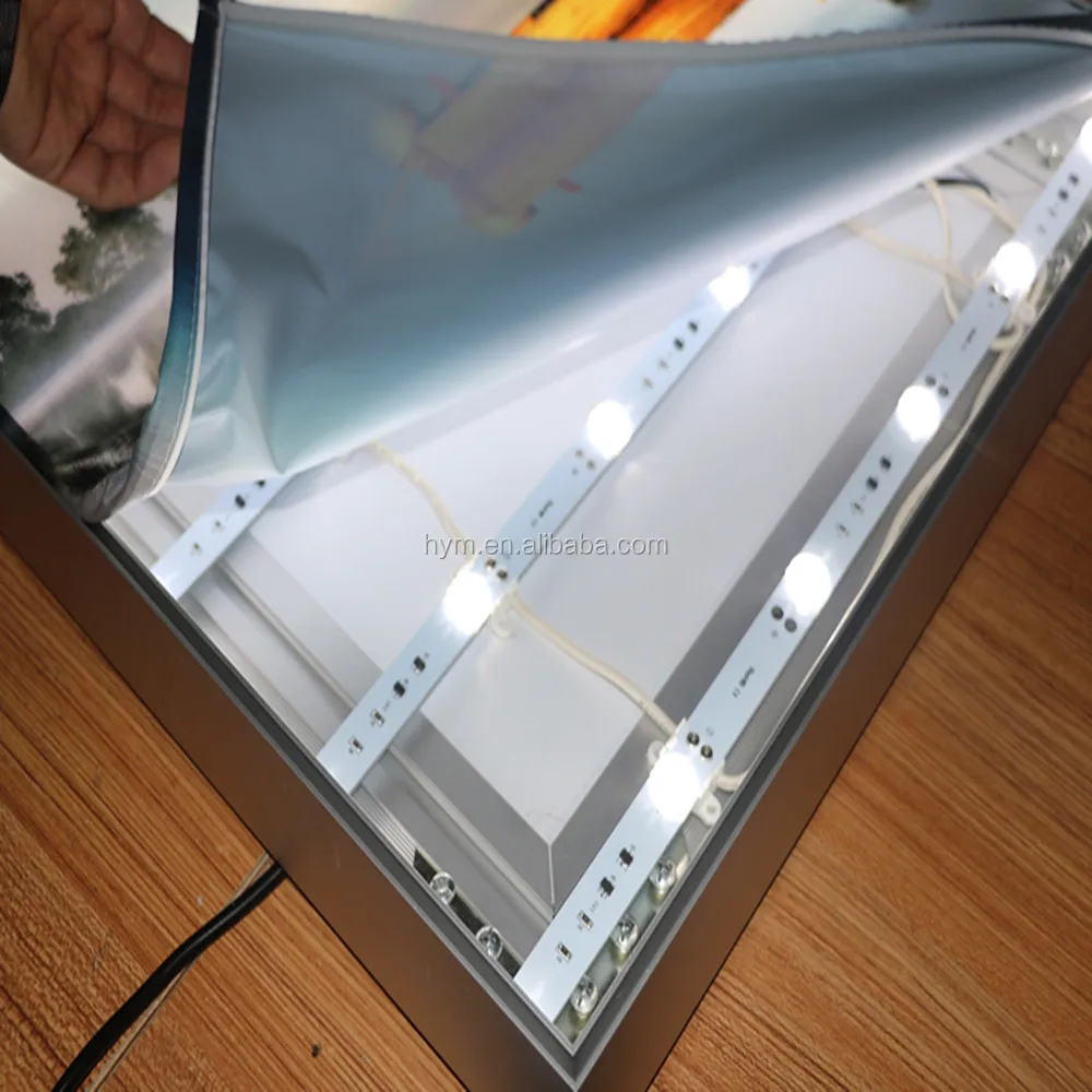 
white color LED lights behind textile graphic panel 