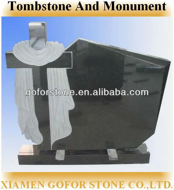 Памятник, черные надгробия, перекрестный гранитный камень