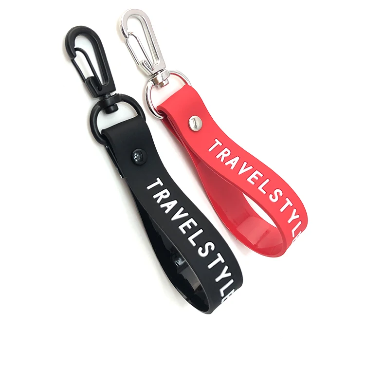 Hot sale black color tape and engraved logo 100% soft silicone wristband key chain