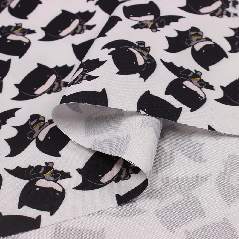 In stock twill peach skin fabric with cartoon batman print for children jacket