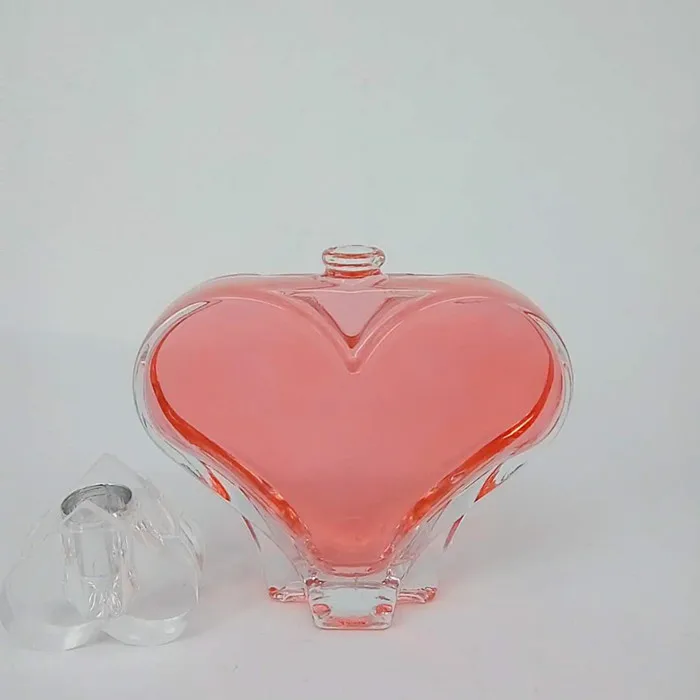 100ml heart shape clear glass perfume bottle luxury glass bottle with heart shape cap