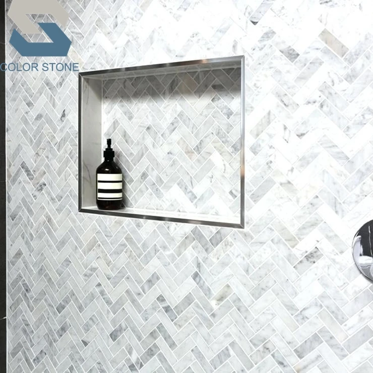 Carrara herringbone marble mosaic shower tile wall bathroom remodel design