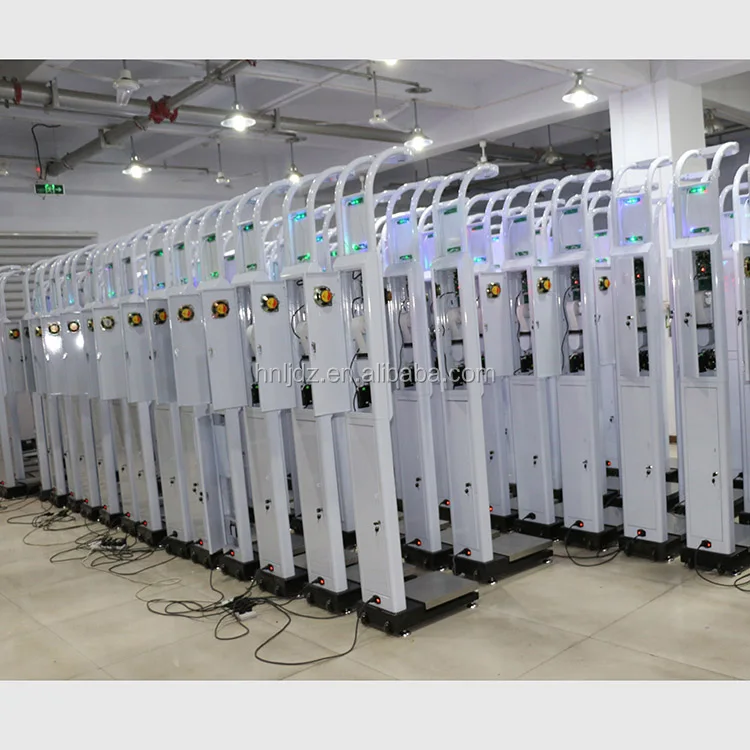 Electronic scale coin machine for measuring body height and weight