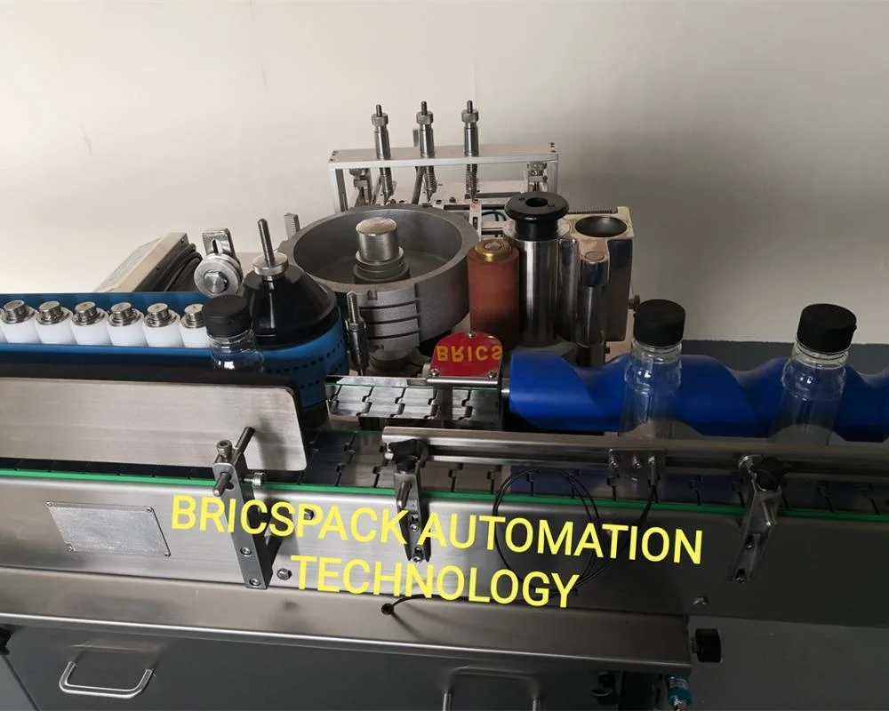 
Wet glue/Cold glue labeling machine for Round glass water bottles paper label 