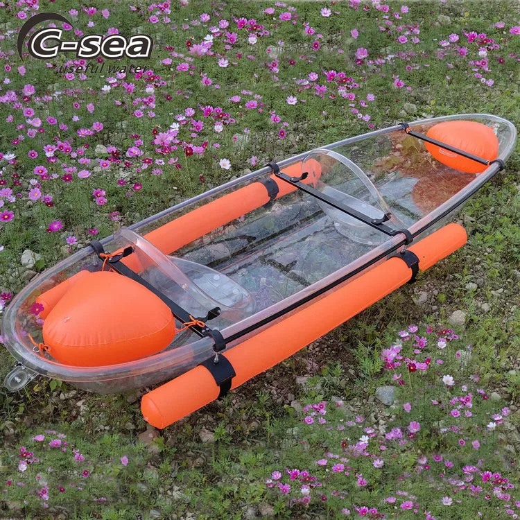 2 person sit in clear bottom kayak