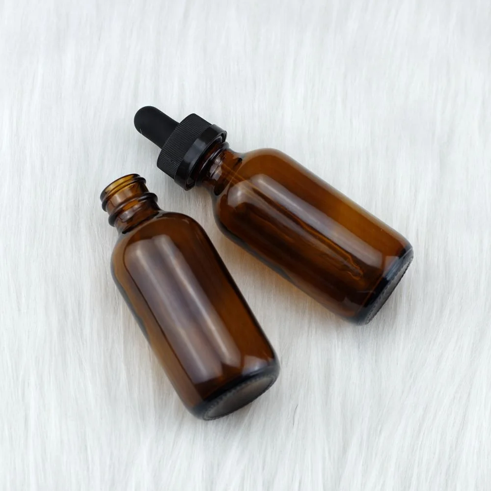 food grade 60ml 2 oz amber glass boston oil dropper bottle with 20-400 child resistant dropper cap graduated glass pipette