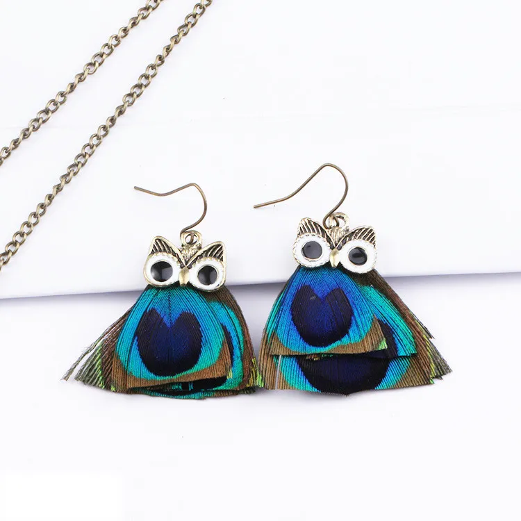Real peacock feather earrings owl earring