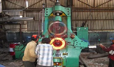 Vertical flange forming machine for rolling rings