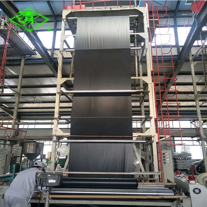 Black plastic ground cover/ weed control mulch layer