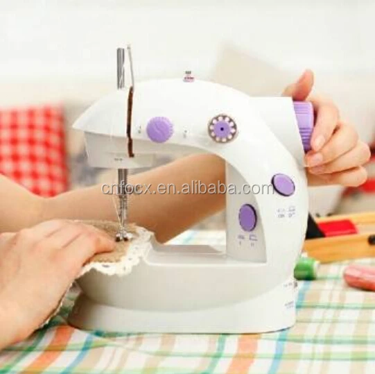Mini Desktop Electric Sewing Machine / manual mini sewing machine / Hand Operated Sewing Machine