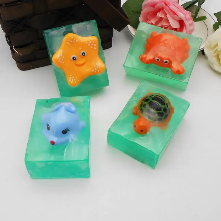 wholesale natural handmade oil custom soap with cartoon figure inside face cleaning handmade toy soap
