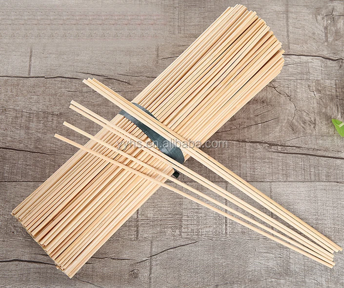 Pick up bamboo wooden sticks for meat