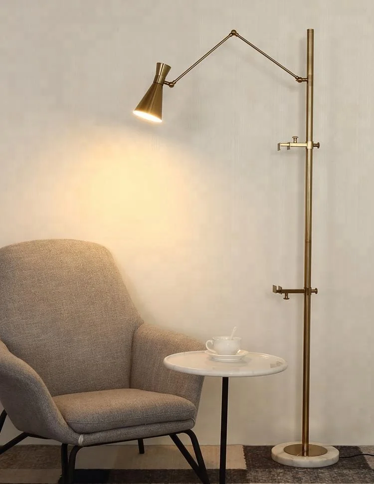 
modern graceful decorative golden metal LED floor lighting with marble holder 