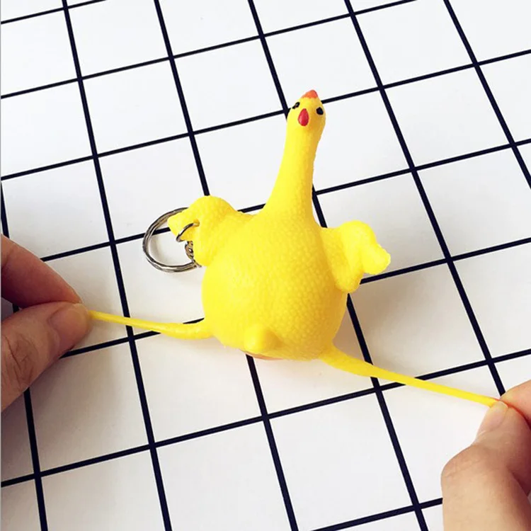 Hot sale  creative yellow chicken prank decompression funny toy rubber keychain