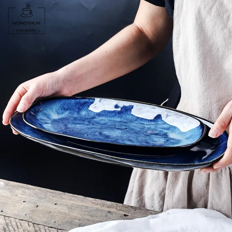 
Wholesale Classic Style Ceramic Reaction Glaze Blue Ellipse Oval Plate Porcelain Fish Cake Plate Charger Serving Plate 